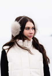 woman wearing fox fur earmuffs