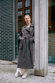a woman's tweed coat in brown colors made in Finland