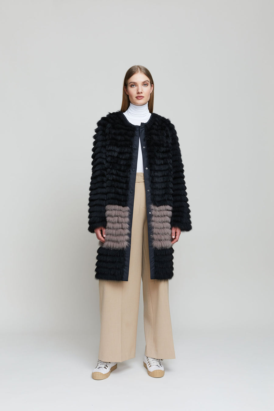 Gemmi's Reversible black fox fur coat with contrast color pockets.  Straight and oversized style