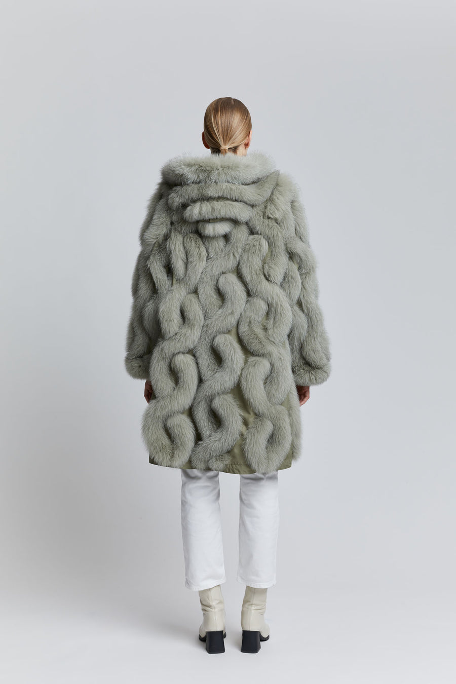 iconic fur coat with a hood Designed and Made in Finland