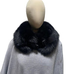 A black fox fur collar with a plastic clip