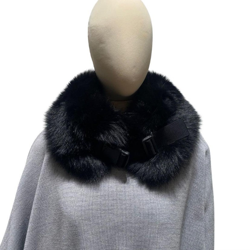 A black fox fur collar with a plastic clip