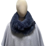 A blue fox fur collar with a large plastic clip 
