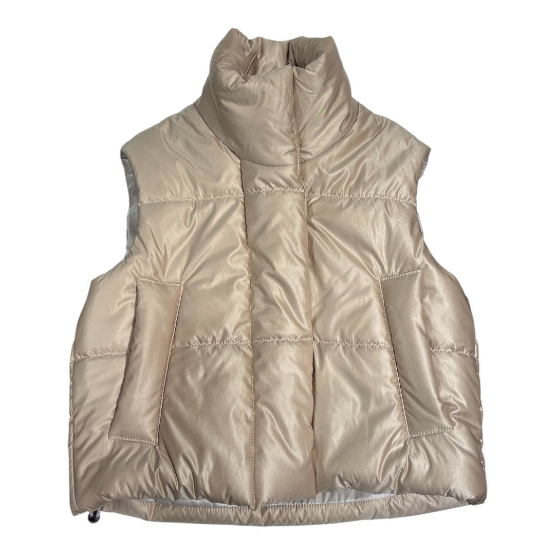 a puffer gilet in light gold color 