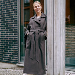 a woman's tweed coat in brown colors made in Finland 