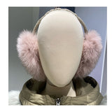 pink fox fur earmuffs with adjustable leather headband 