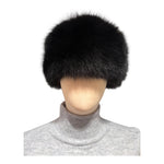 A black fox fur hat in pillbox style, made in Finland from real fox fur skins sourced from  Saga FUrs 