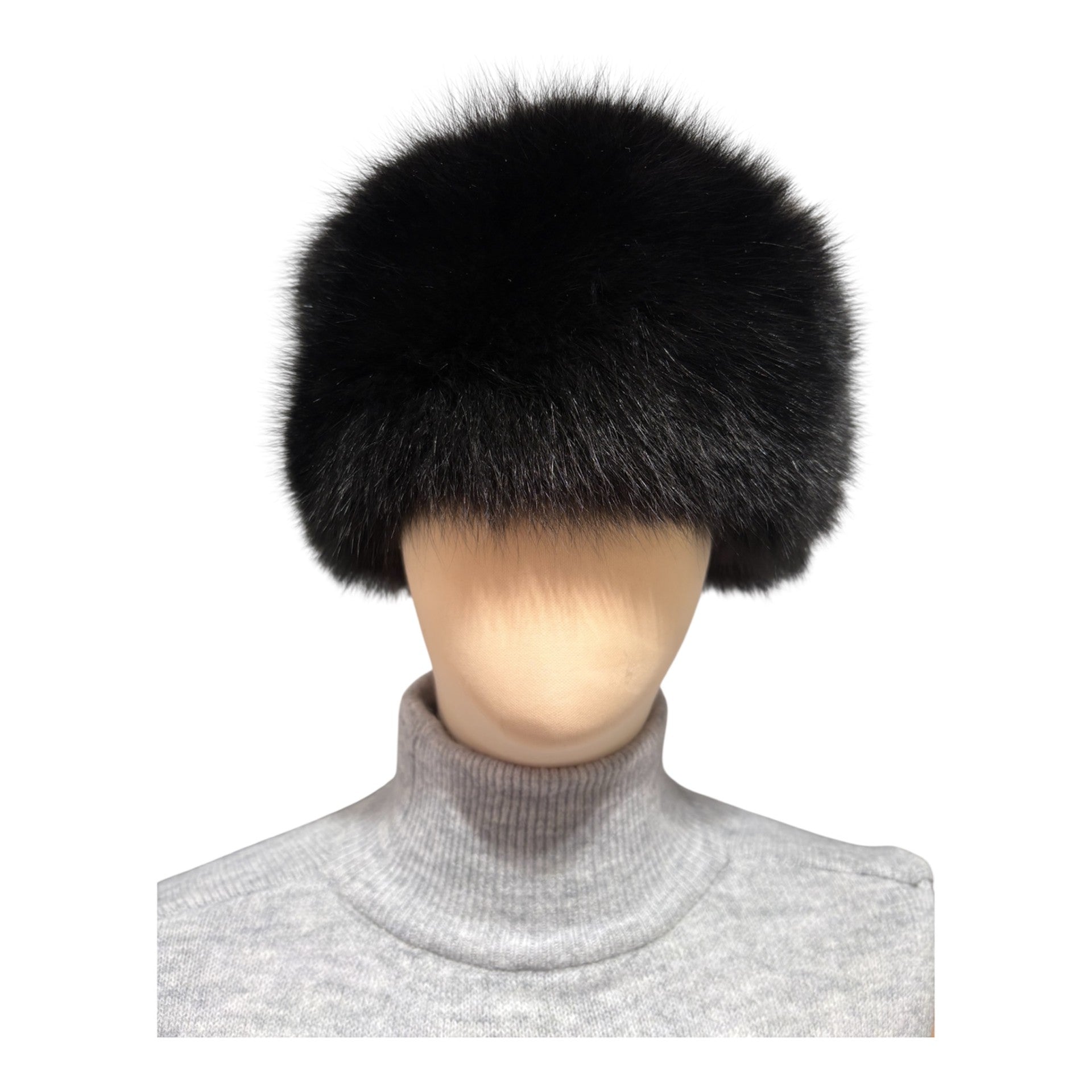 A black fox fur hat in pillbox style, made in Finland from real fox fur skins sourced from  Saga FUrs 