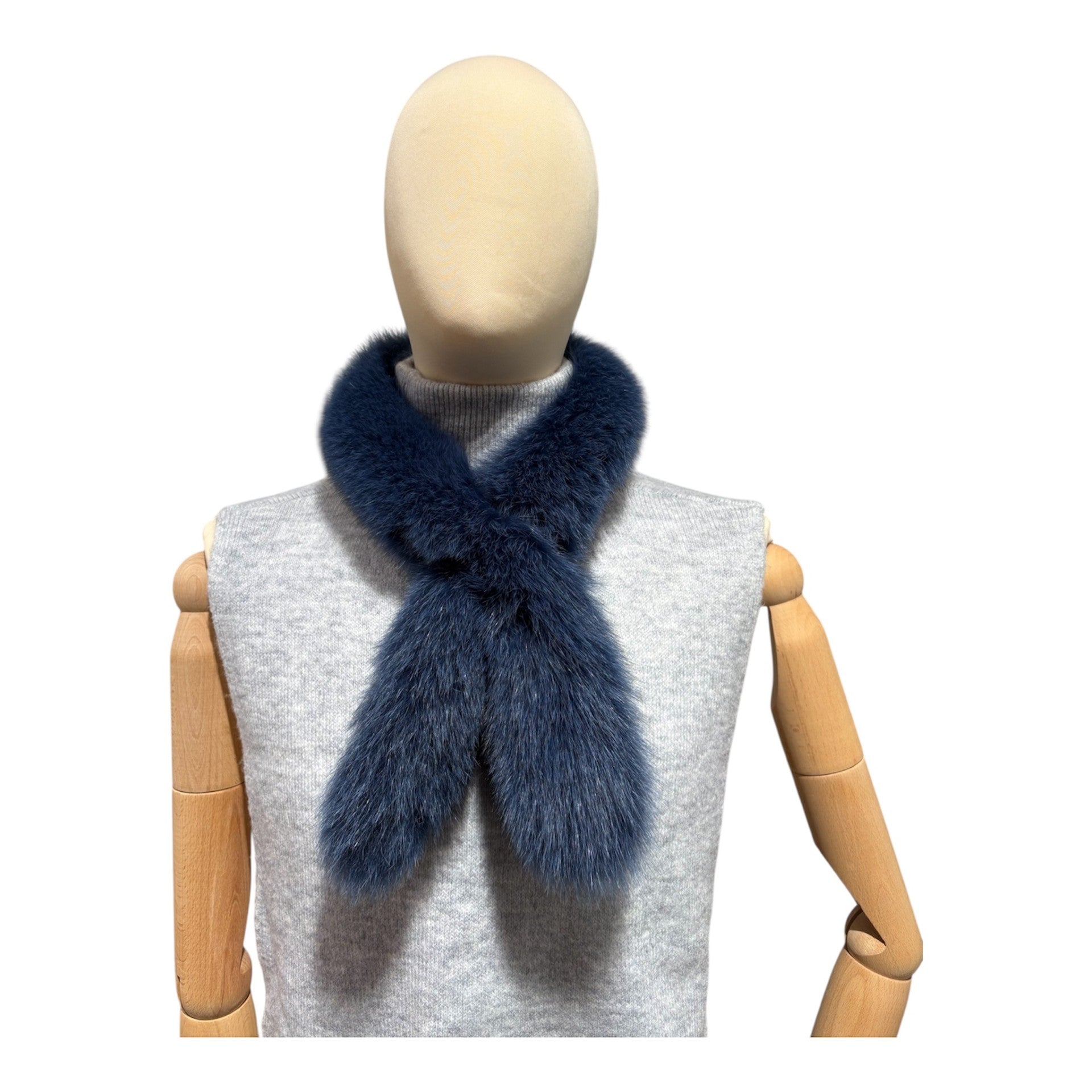 A bright blue fox fur scarf 