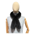 A fox fur scarf in off-black color 