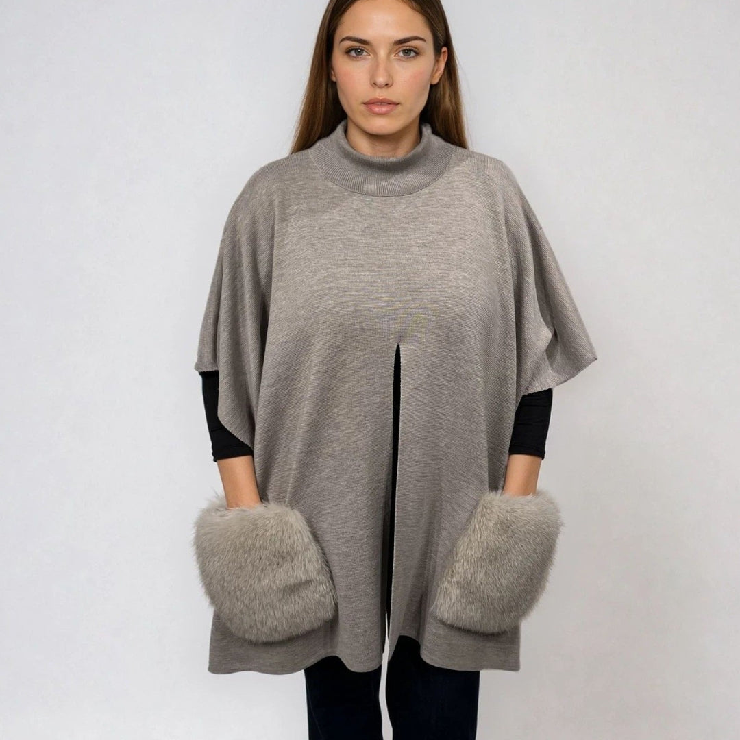 KNITTED PONCHO WITH FUR POCKETS