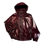Windbreaker jacket in dark cherry color, walking gear or running gear. 