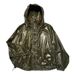windbreaker jacket in green shiny material. walking gear or running gear. GORP