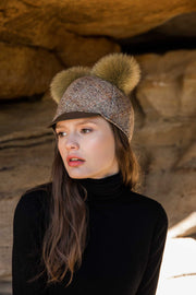 Hat made from Harris tweed with fun fur pompoms