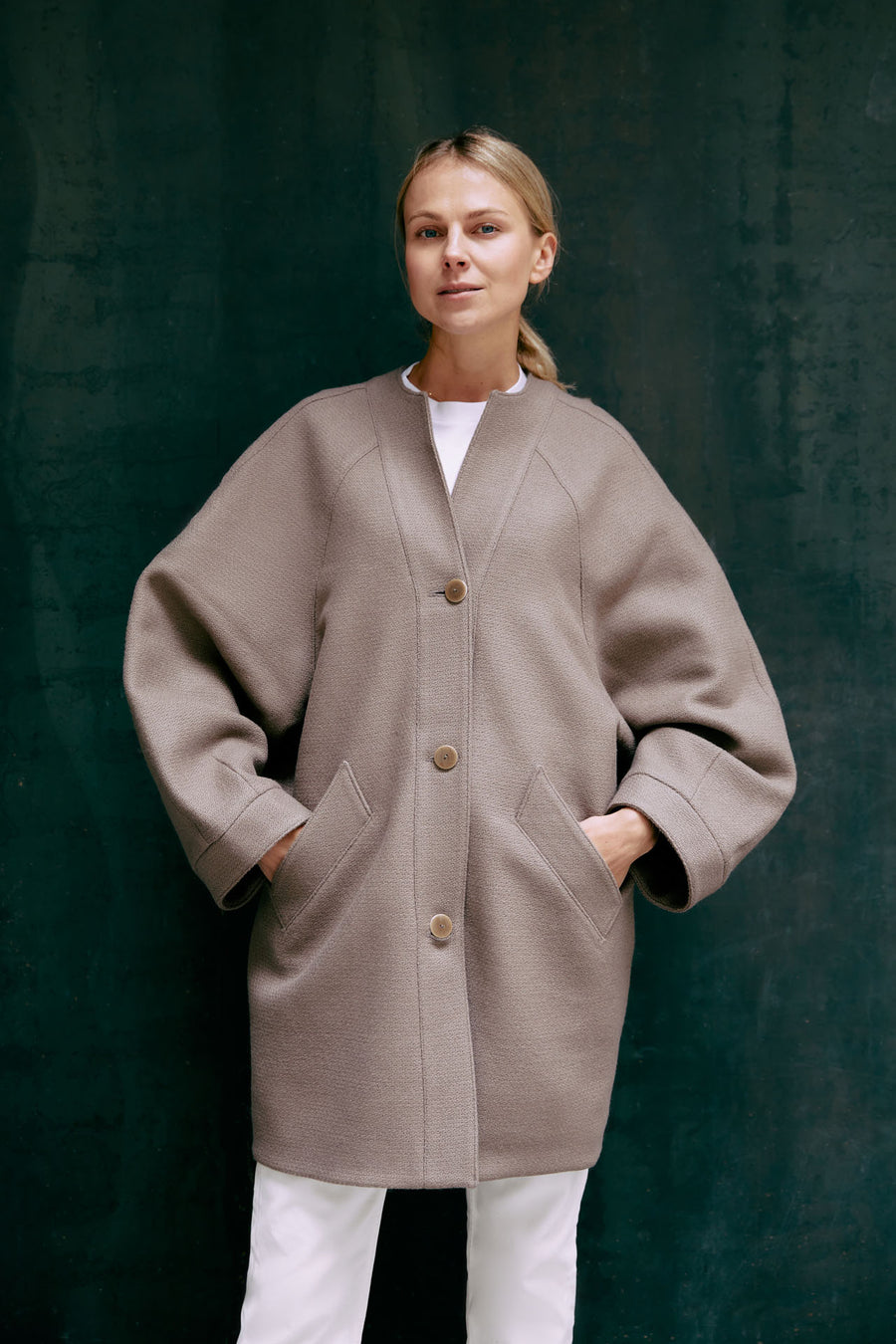 Quiet luxury is a warm wool coat on a cool Spring day  