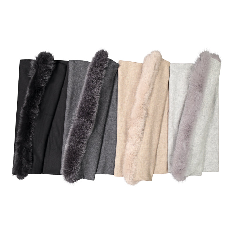 Big cashmere wrap with a luxurious fox fur trim in matching colour.  Designed and Made in Finland