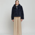 Cropped reversible women's black fox fur jacket.