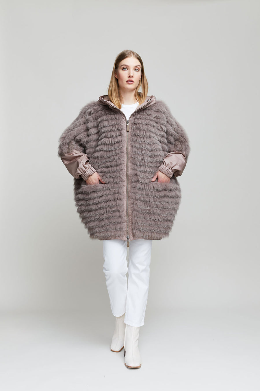 Gemmi reversible fox fur jacket has a padded hood and sleeves. 