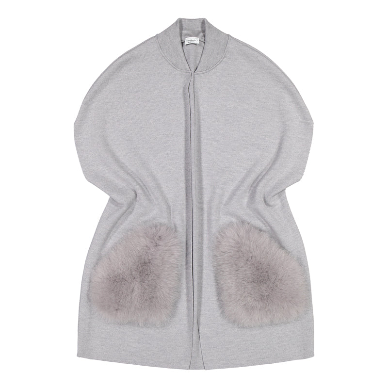A knitted classical merino vest with large fur pockets