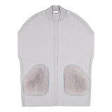 A knitted classical merino vest with large fox fur pockets