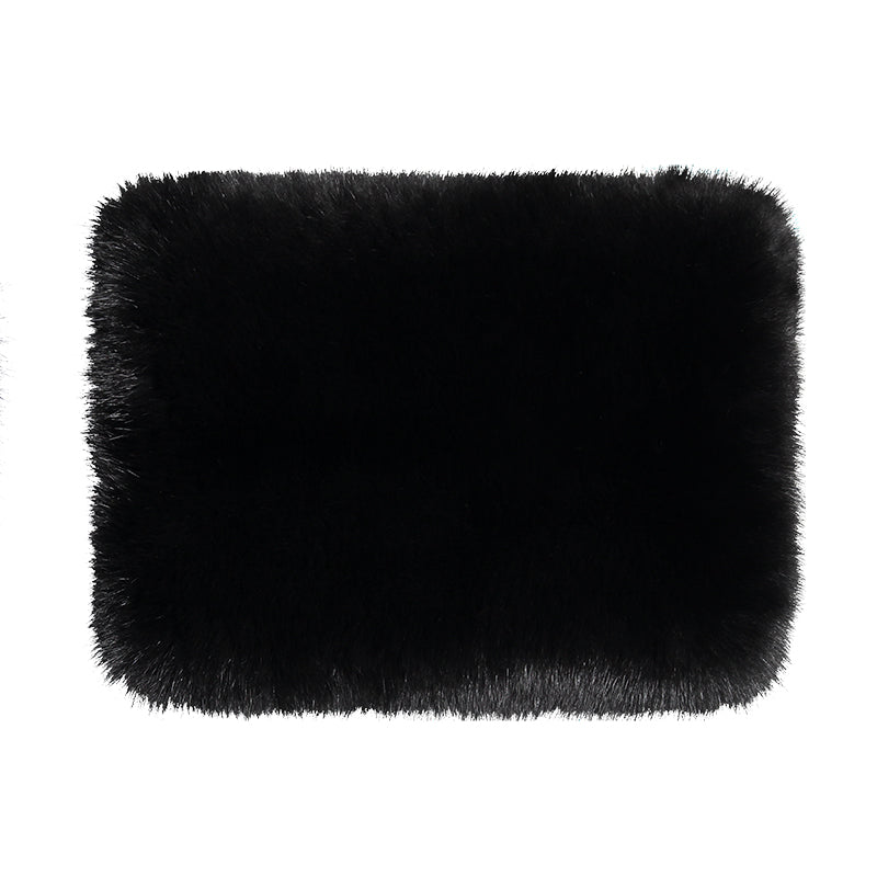 Large soft clutch, designed as a deep sack in black fur