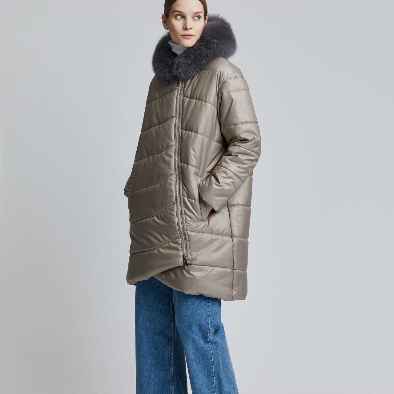 GEMMI-young-female-in-light-puffer-coat-with-hood