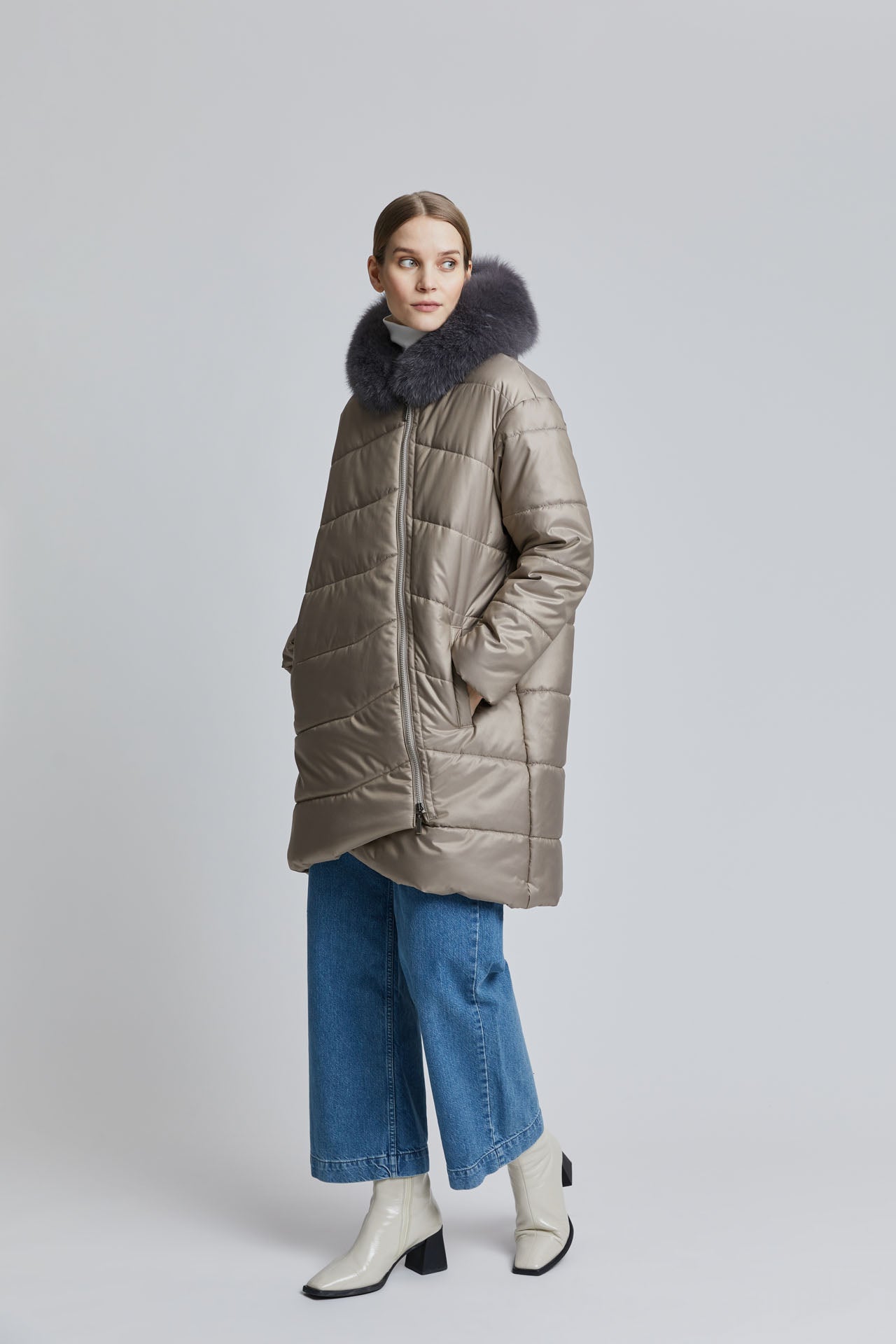 GEMMI-young-female-in-light-puffer-coat-with-hood