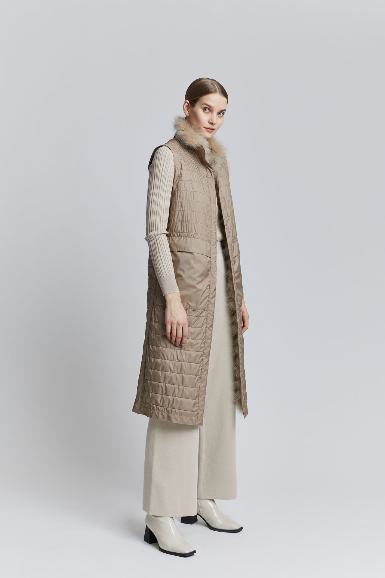 Reversible fox fur vest Straight but slightly wider at the hem