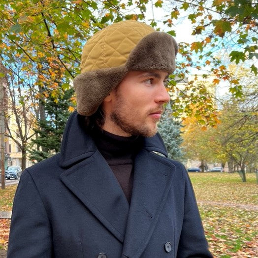 A light traditional trapper-style hat with a contemporary twist