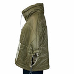 limited edition product is available in three colors. The orange and olive anoraks have a light beige lining and large pocket with zipper. The black anorak is all black. 