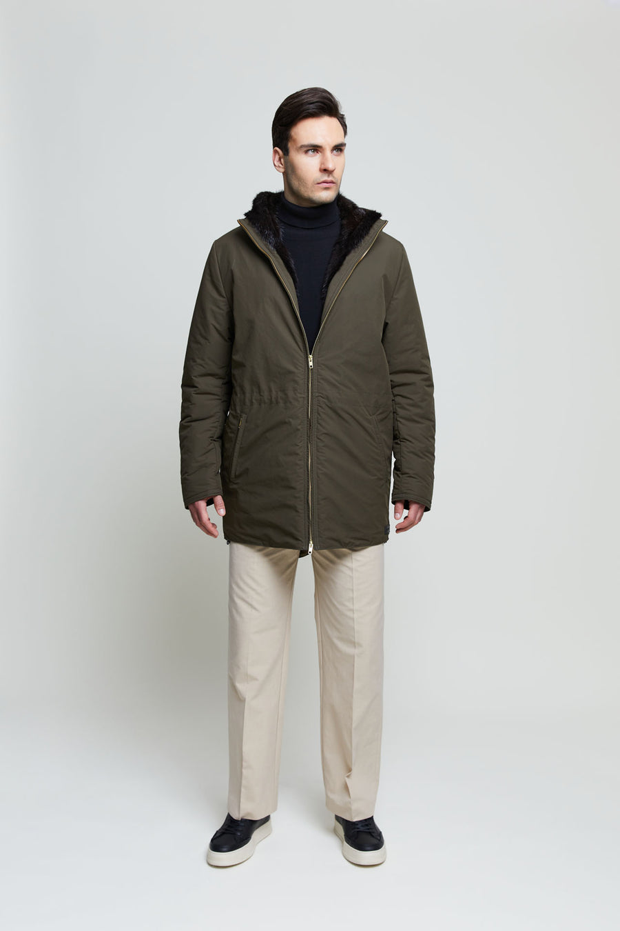 The shorter version of our men’s parka is a perfect city overcoat