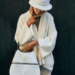 shopper with beautiful white merino lambskin and a large pocket with zipper 